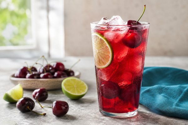 Berry Cherry Lime Iced Tea with cherries, berries and fresh lime